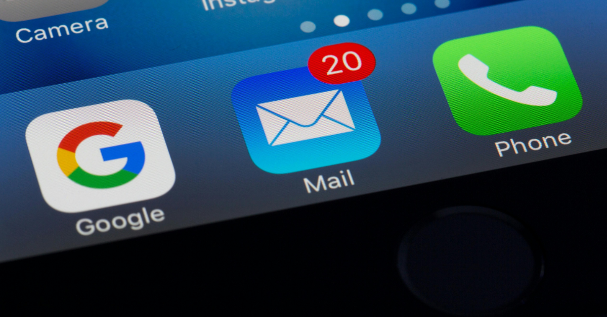 An email logo on a phone screen displaying 20 notifications